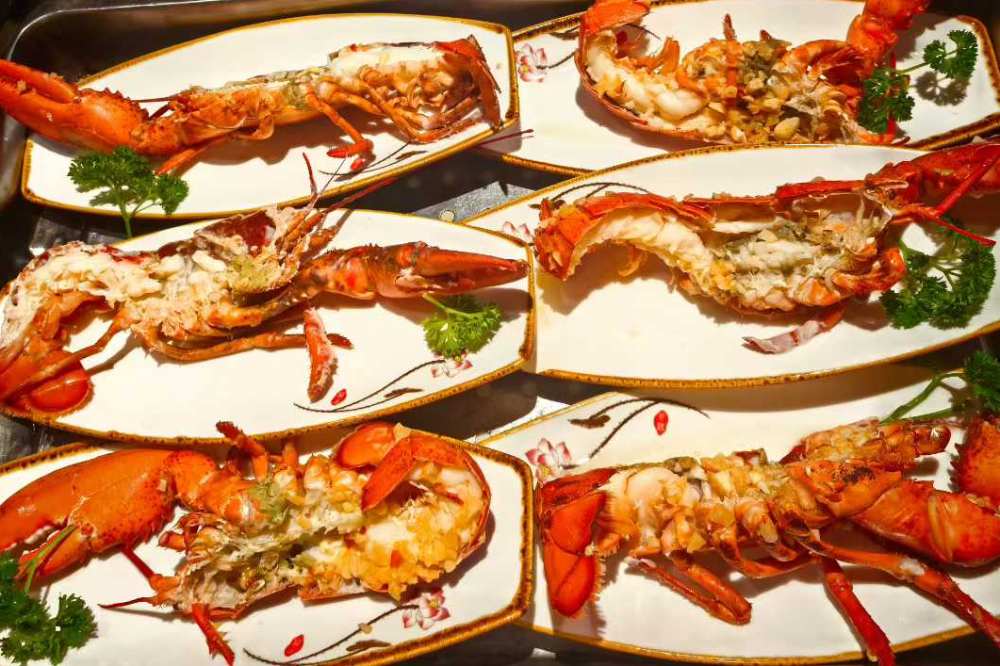 海鮮蒸鍋+每人波士頓龍蝦半隻-食在山東